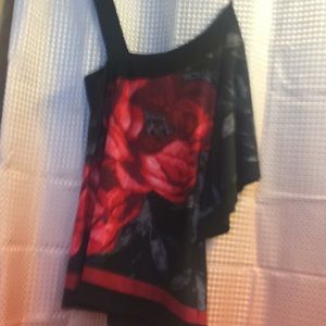 One sleeve blouse..fits S-M $6 like new